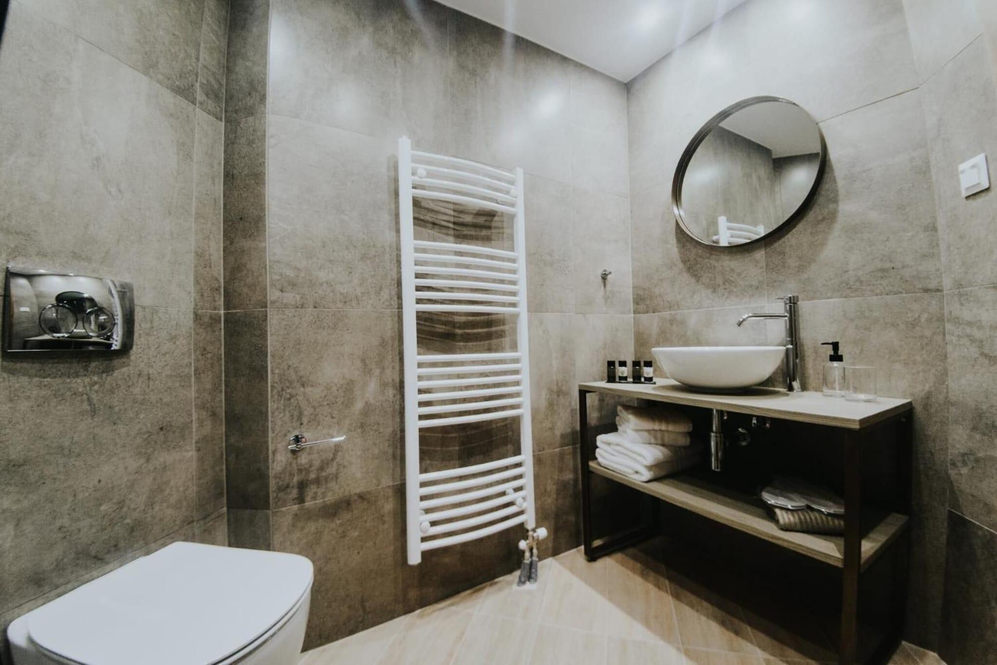 Фото Voulis Attico Rooms & Apartments