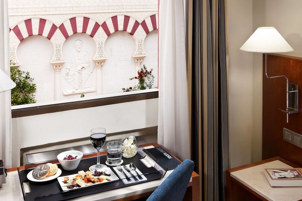 Фото Nh Córdoba Califa Hotel