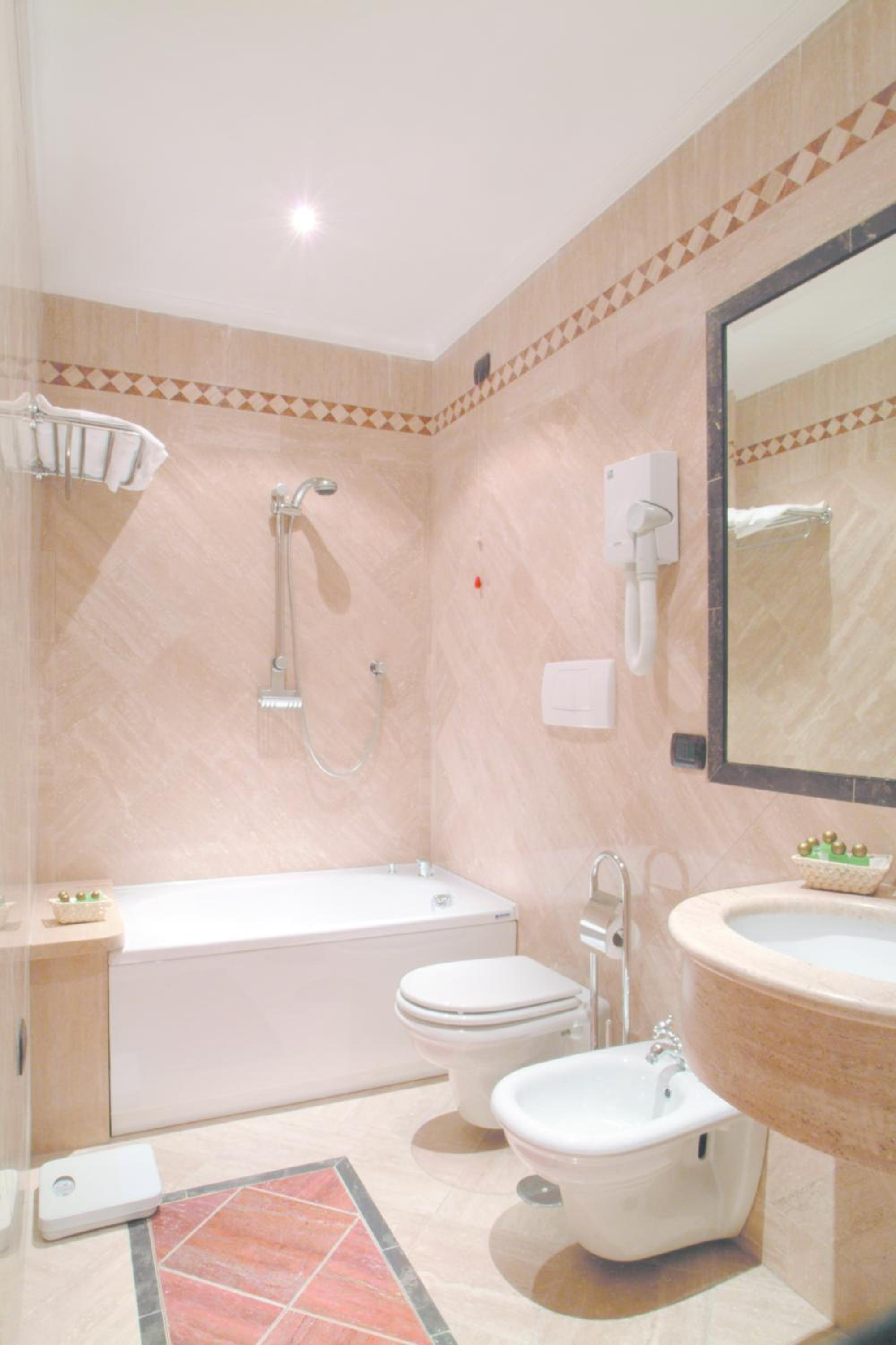 Фото Colosseo Studio Suites