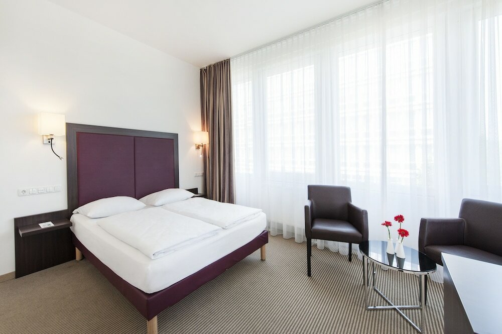 Фото Acom-Hotel Munich