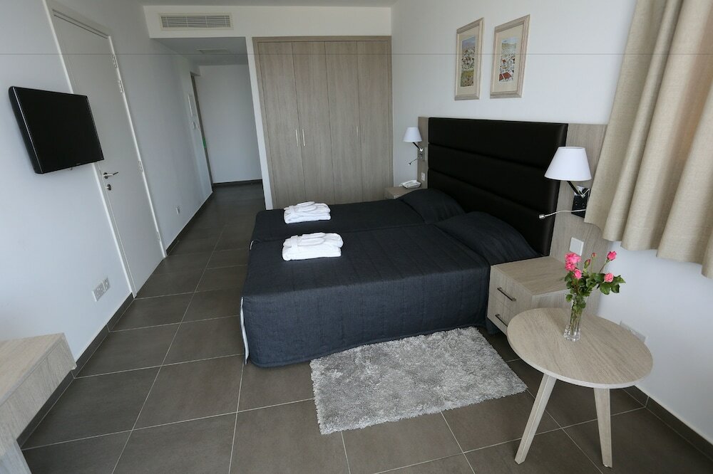 Фото Dionysos Central Hotel