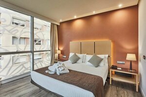 Гостиница Hotel Silken Puerta de Valencia