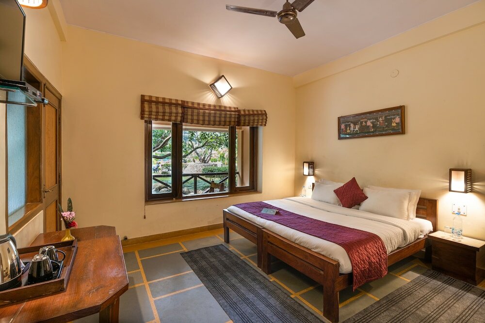 Фото Corbett Wild Resort - A River Access Property