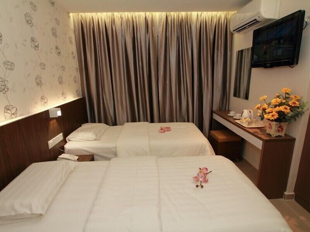 Фото Tai Ichi Hotel