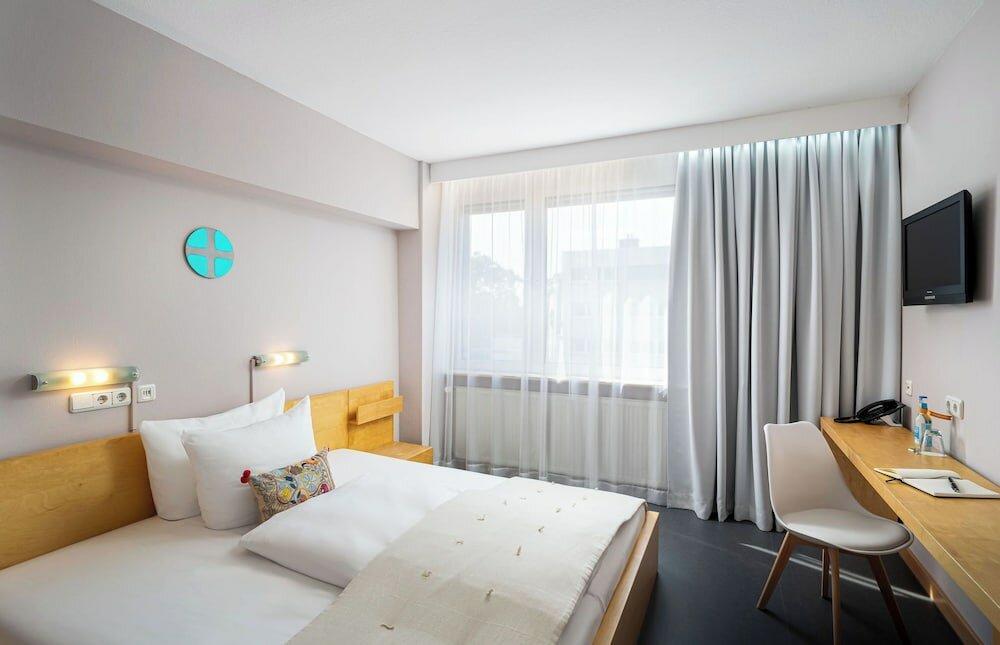 Фото Mainhaus Stadthotel Frankfurt