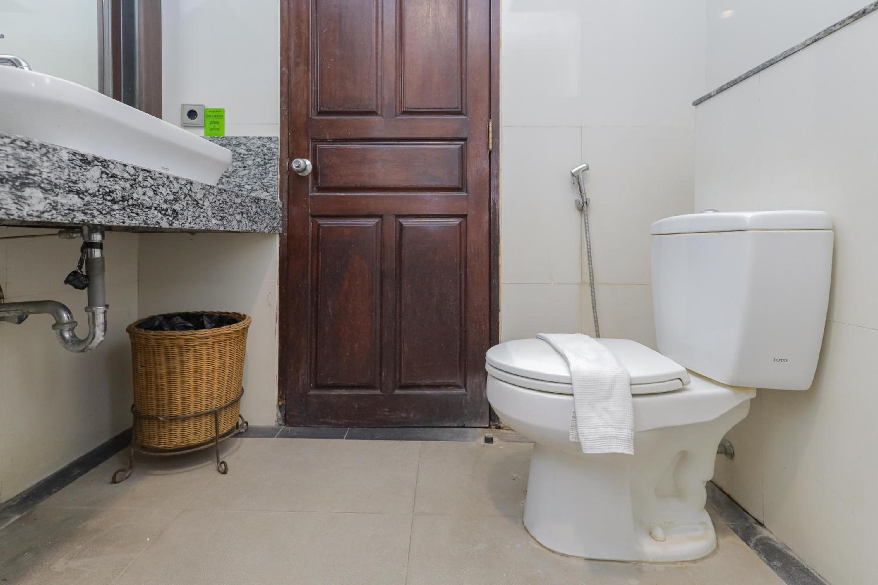 Фото Urbanview Hotel Taman Suci Denpasar Bali