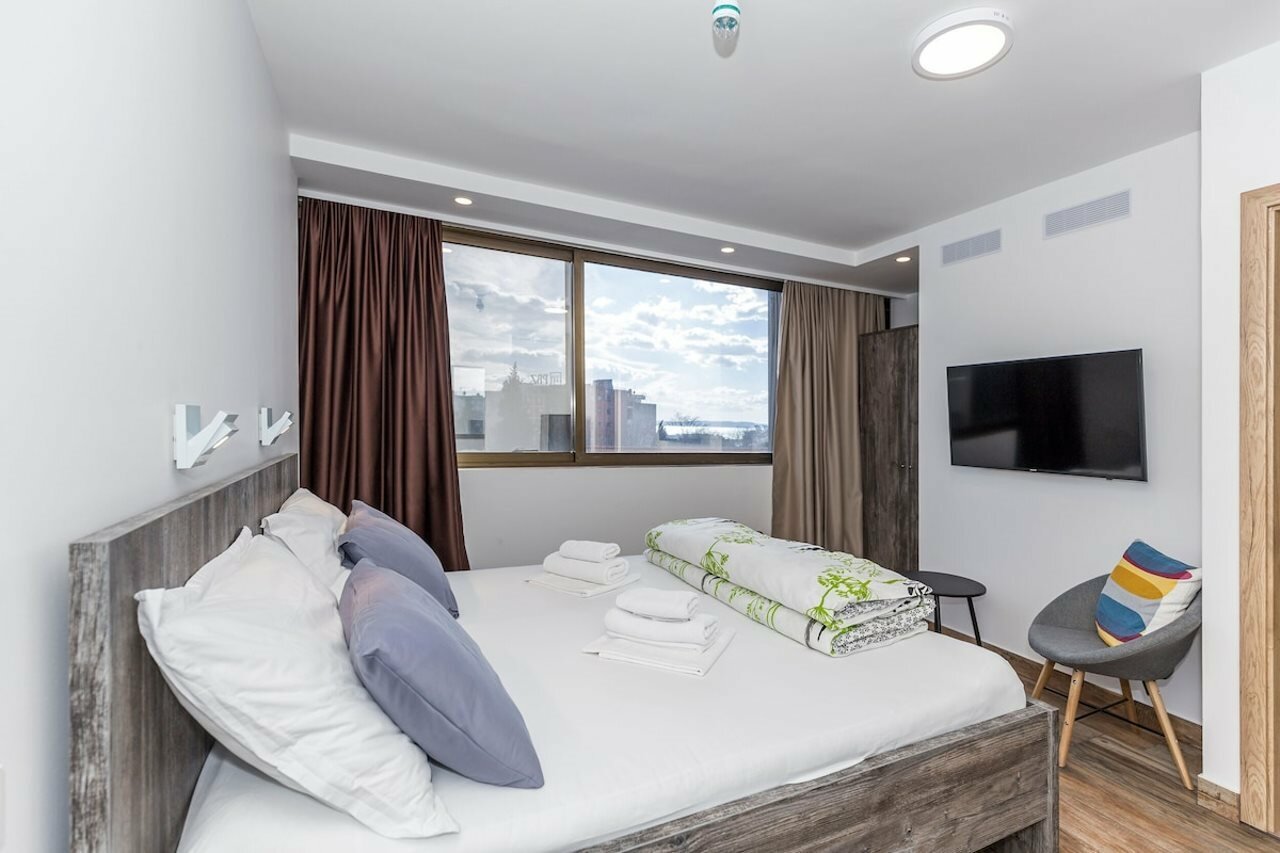 Фото Apinelo Tower Rooms