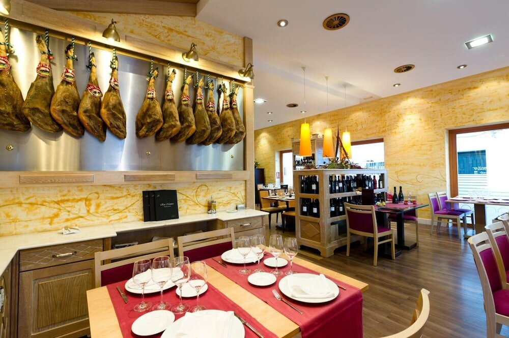 Фото Aparthotel Capitolina