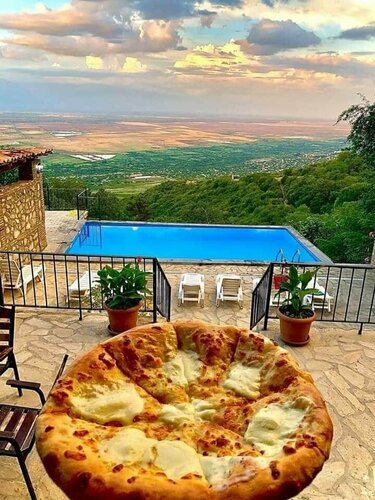 Внешний вид отеля Guest House Kusika в Сигнахи, фото 1