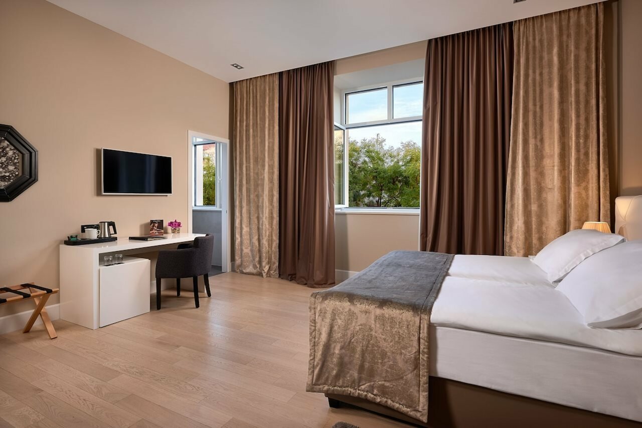 Фото Cornaro Hotel