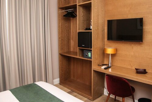 Гостиница Toledo Relais Suites в Неаполе