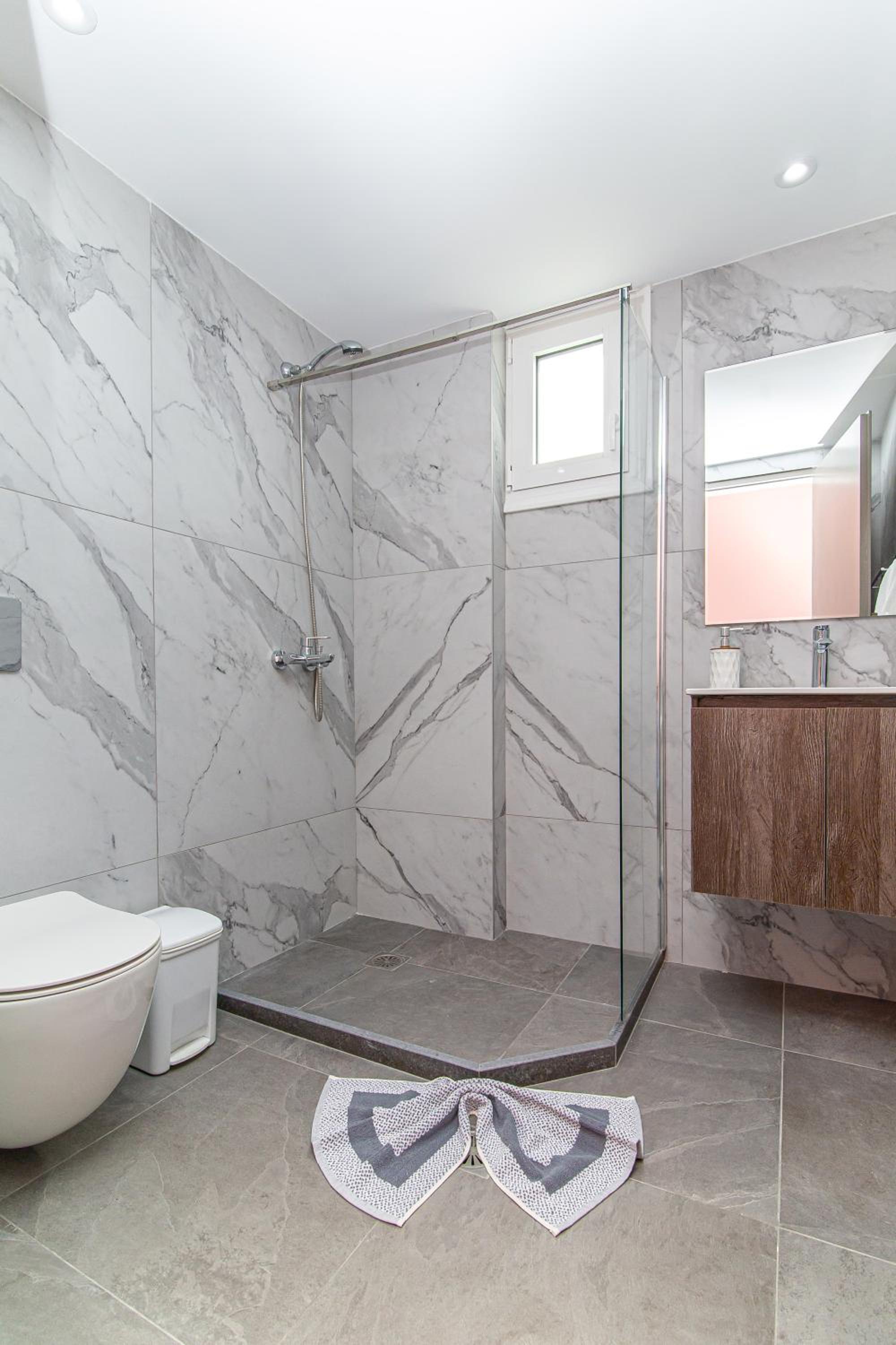 Фото Theoni Apartments