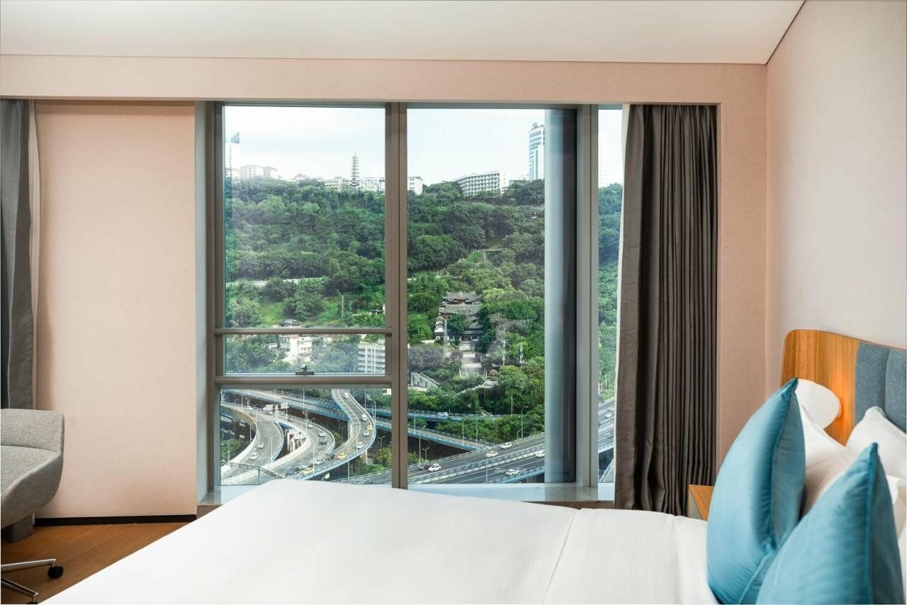 Фото Pagoda Hotel Chongqing International Land-sea