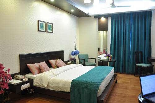 Фото Hotel Rockland Panchsheel Enclave