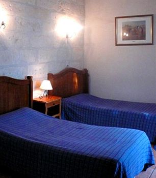 Фото Au Saint Roch - Hôtel et Jardin