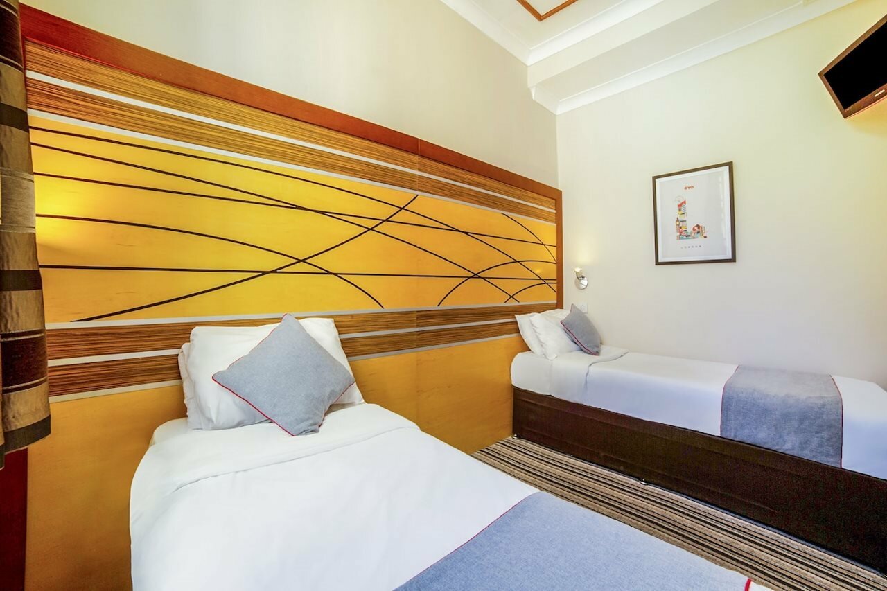 Фото Oyo Vegas Hotel
