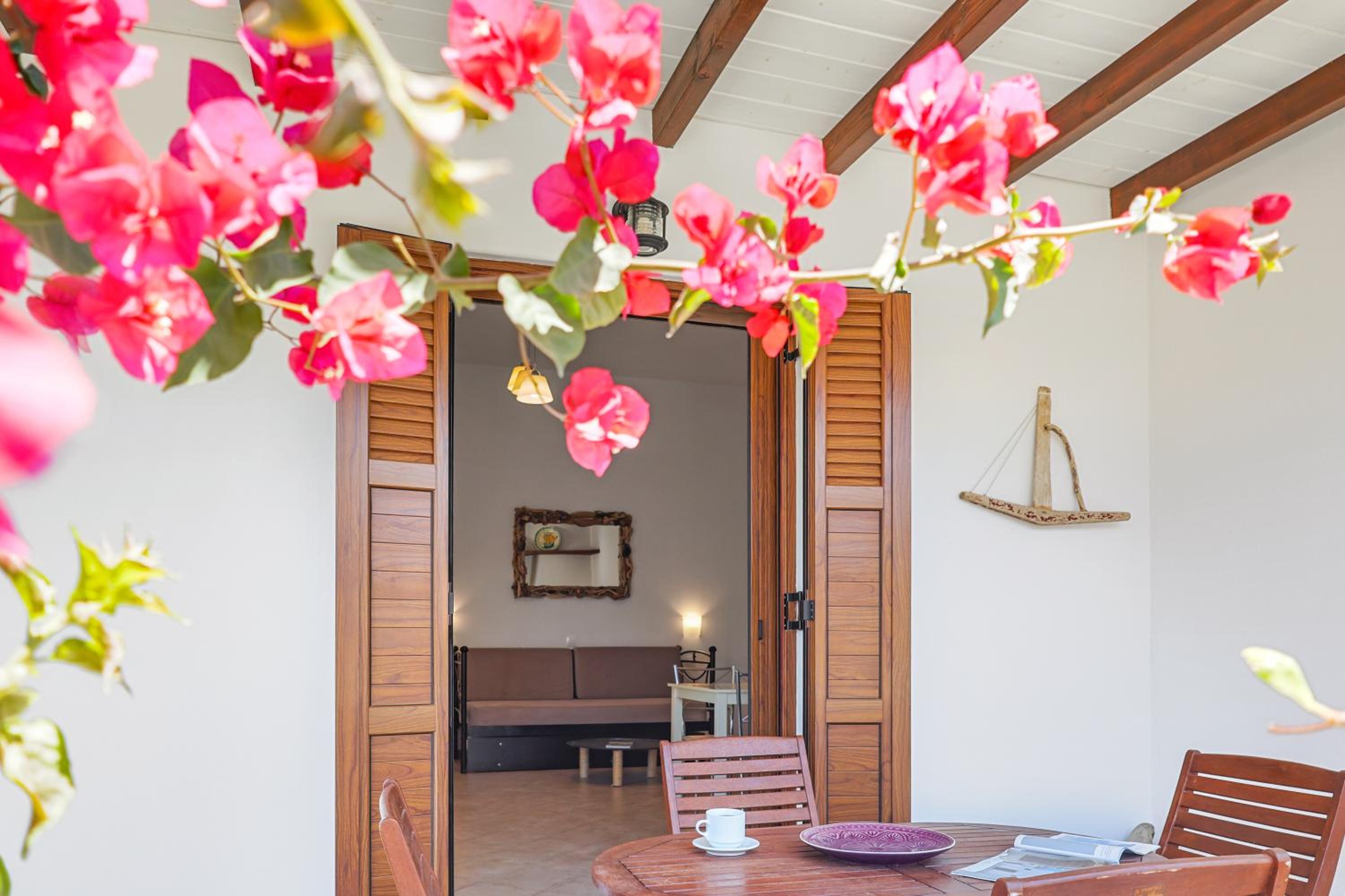 Фото Anemonisia Deluxe Apartments & Mesonettes