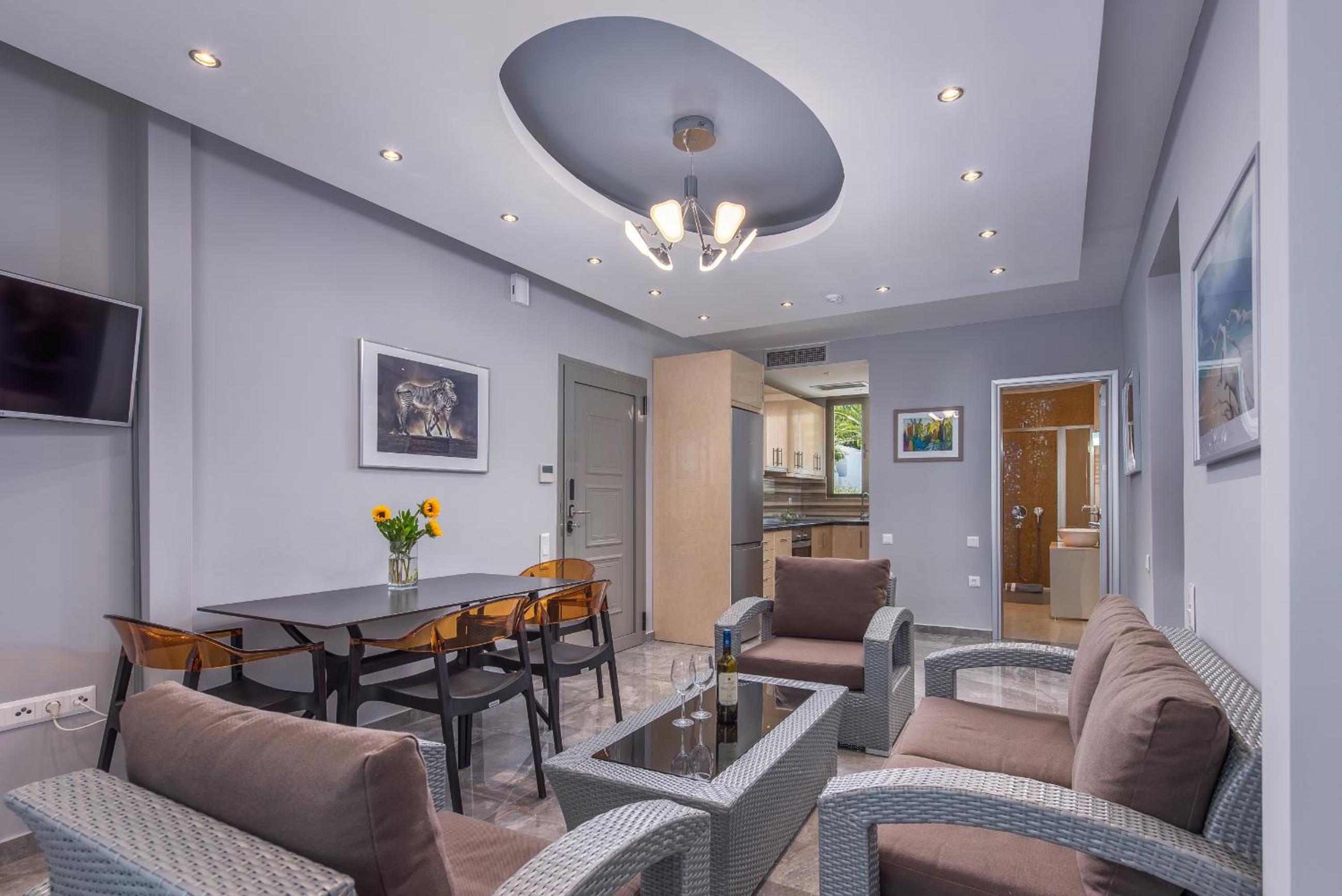 Фото Dionysos Hotel & Suites