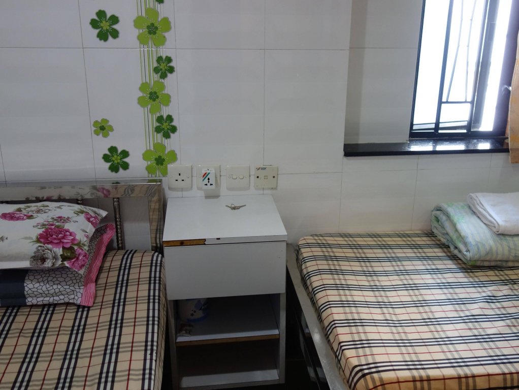 Фото New China Guesthouse