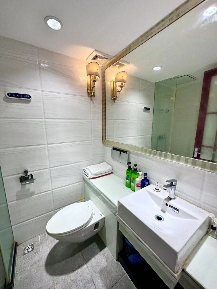 Фото Guangzhou Damei Apartment