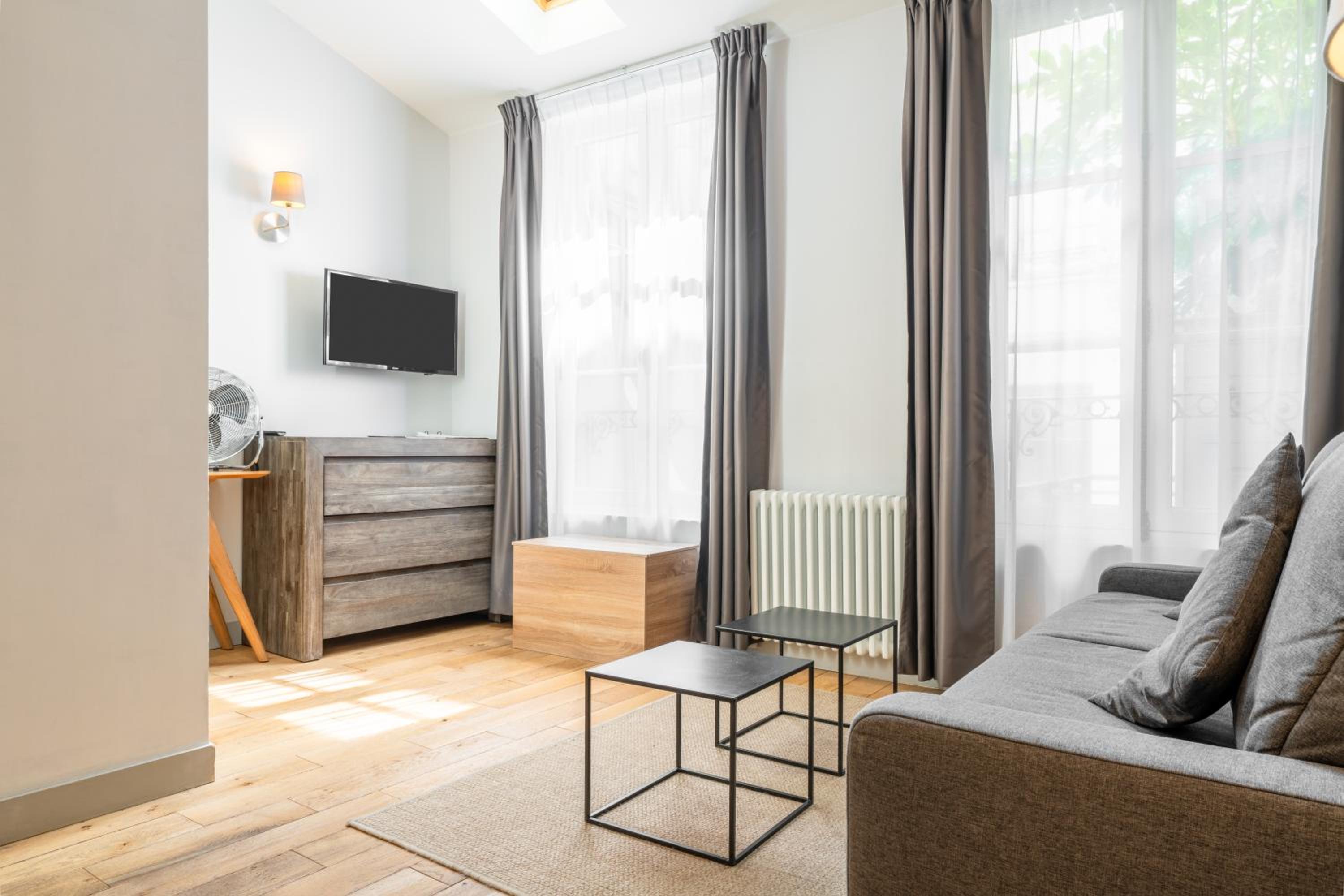 Фото Les Apparts de l'Oncle Louis