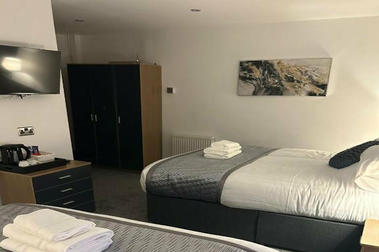 Фото Woodhouse Hotel