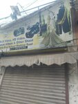 Photographs shop (Province of Punjab, Lahore, Major Jameel Shaheed Road), copy center