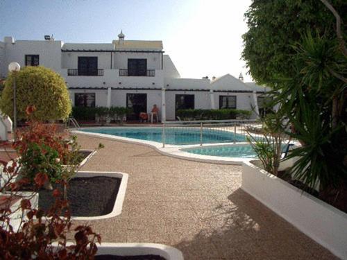 Фото Apartamentos La Laguneta