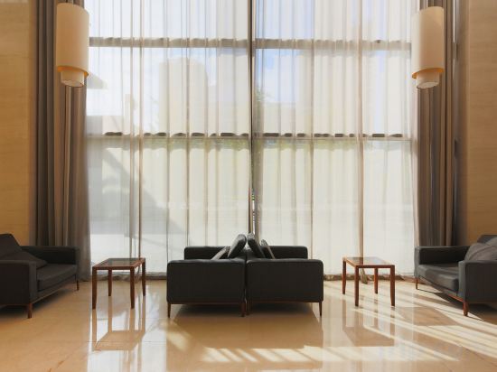 Фото Howard Johnson Parkland Hotel Dalian