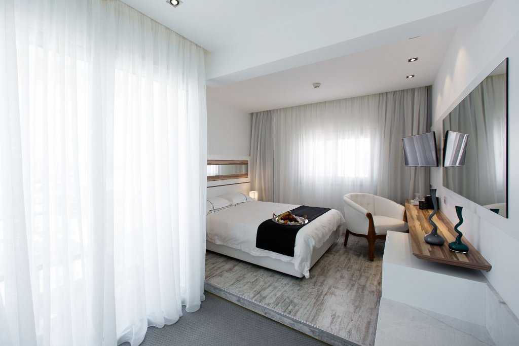 Фото The Ciao Stelio Deluxe Hotel