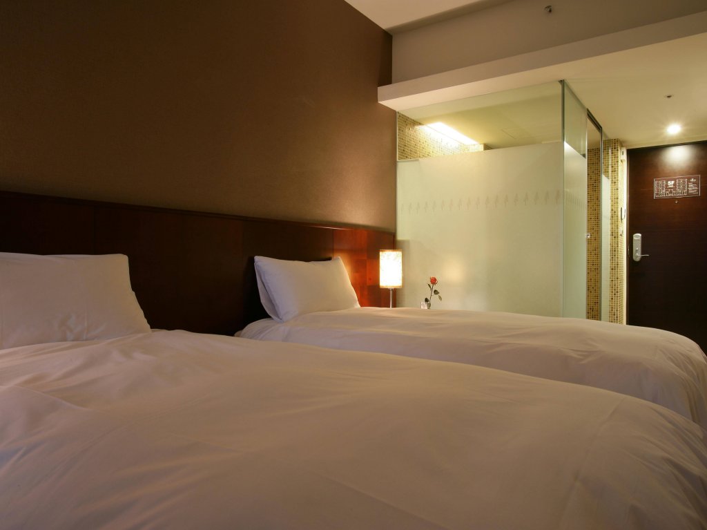 Фото In One City Inn