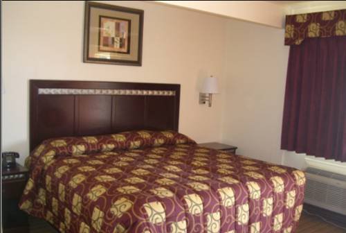 Фото Whispering Palms Inn