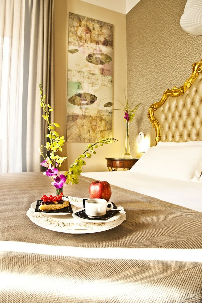 Фото Corso 12 Rooms and Suites