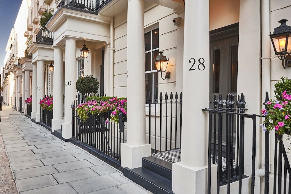 Фото Tophams Hotel