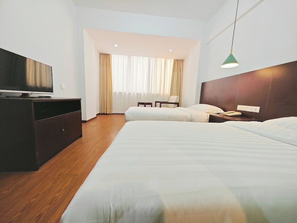 Фото Xinghua Hotel