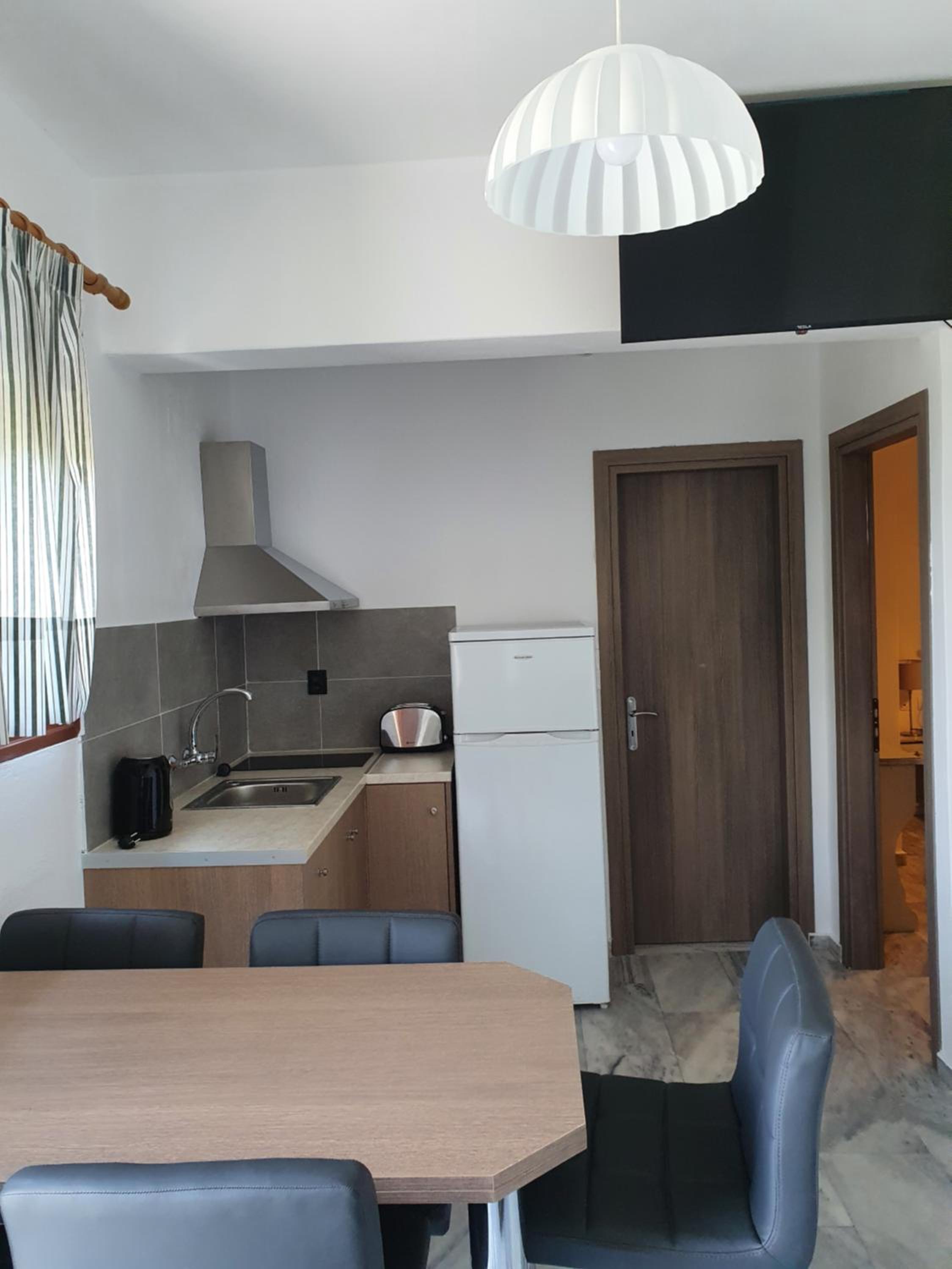 Фото Kiki Studios & Apartments