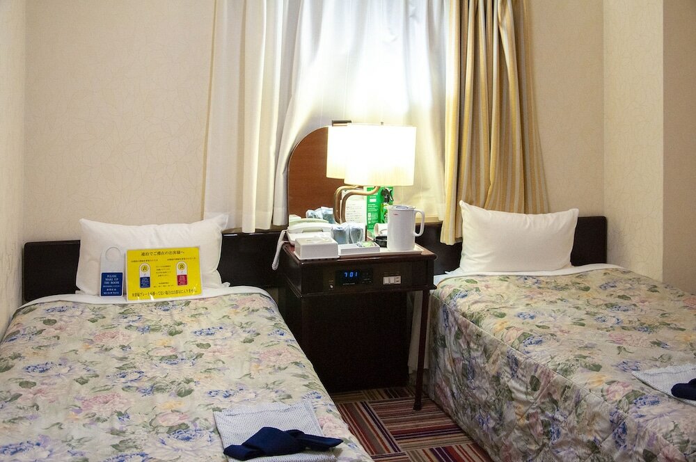 Фото Hotel Livemax Umeda Central