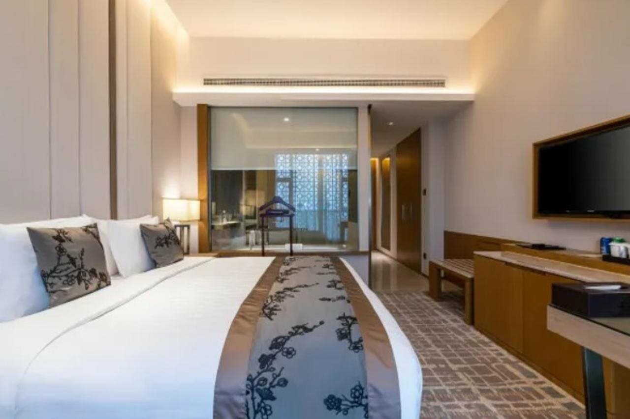 Фото Days Hotel & Suites Liangping