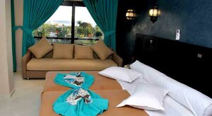 Гостиница Suite Hotel Tilila