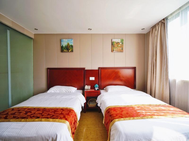 Фото GreenTree Inn ShangHai BaoShan 128 Memorial Road TongHe Road Shell Hotel