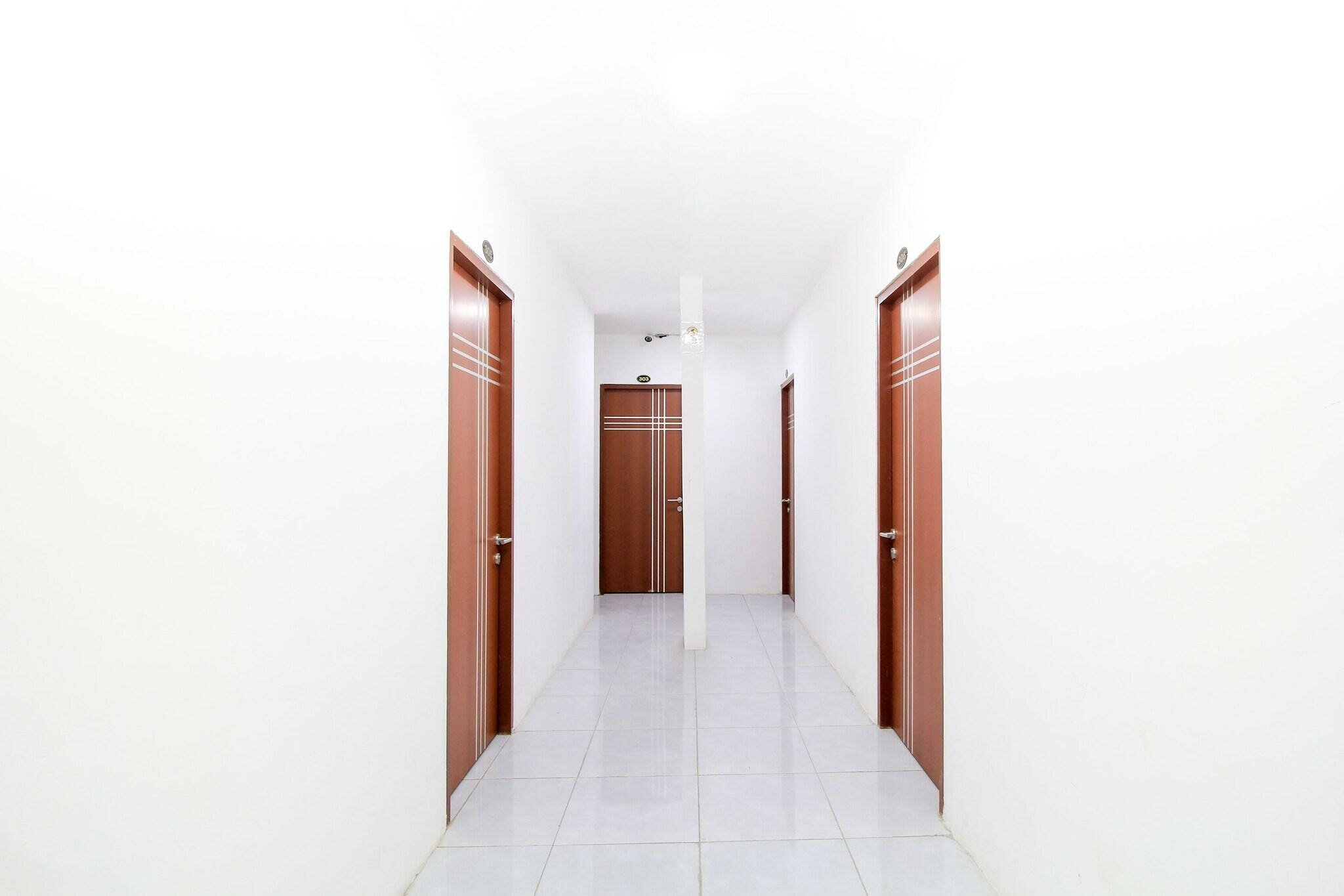 Фото Oyo 217 A1 Hotel