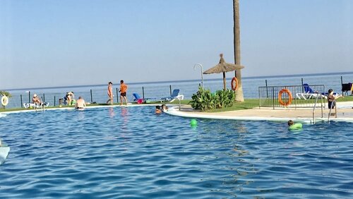 Гостиница Apartamento Mi Capricho con vistas al Mar y Piscina