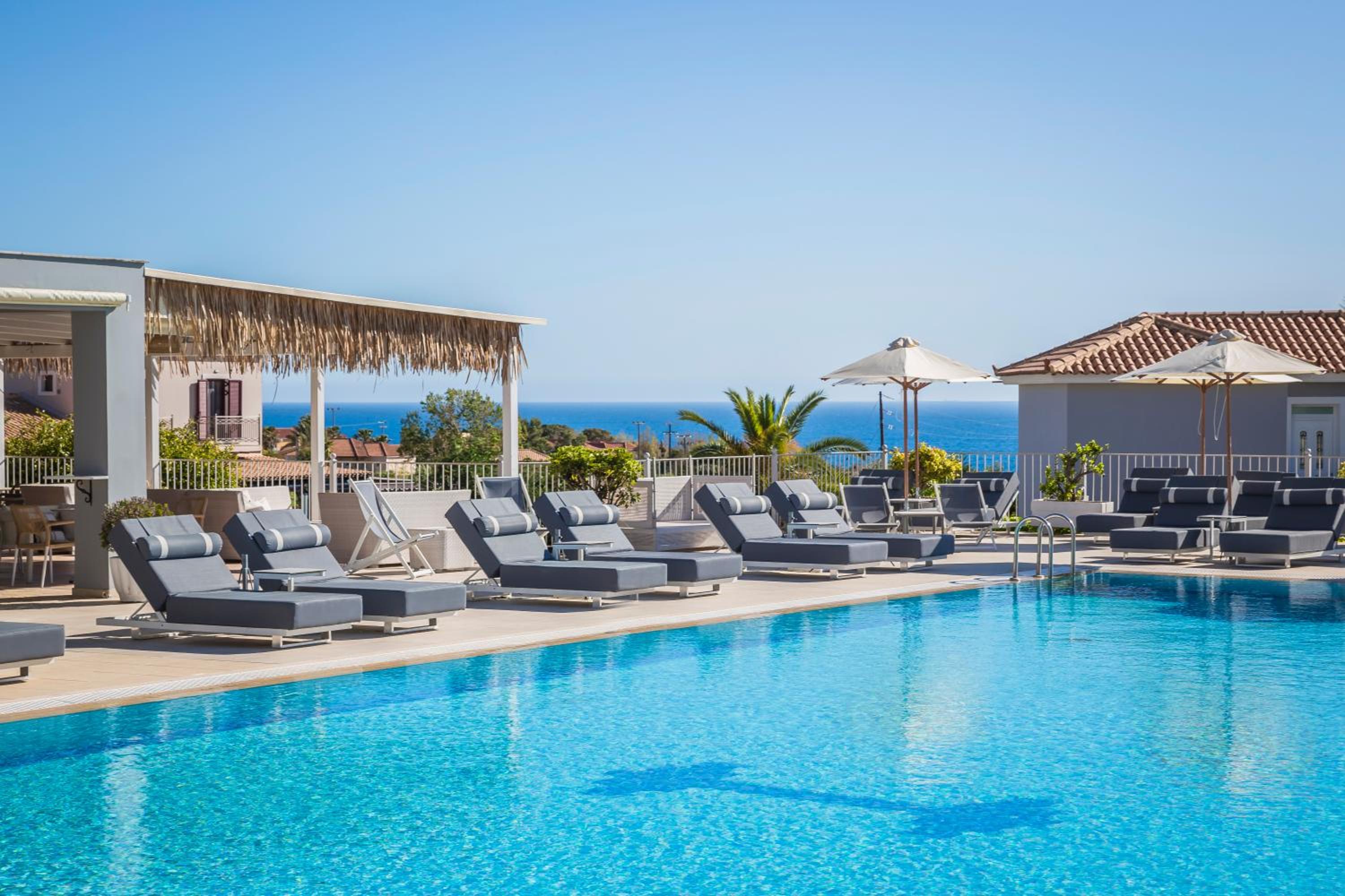 Фото Astra Village Hotel Suites