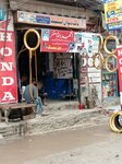 Ahmed Honda wheel balancing (Province of Punjab, Lahore, Gulshan Yaseen Colony), bicycle repair