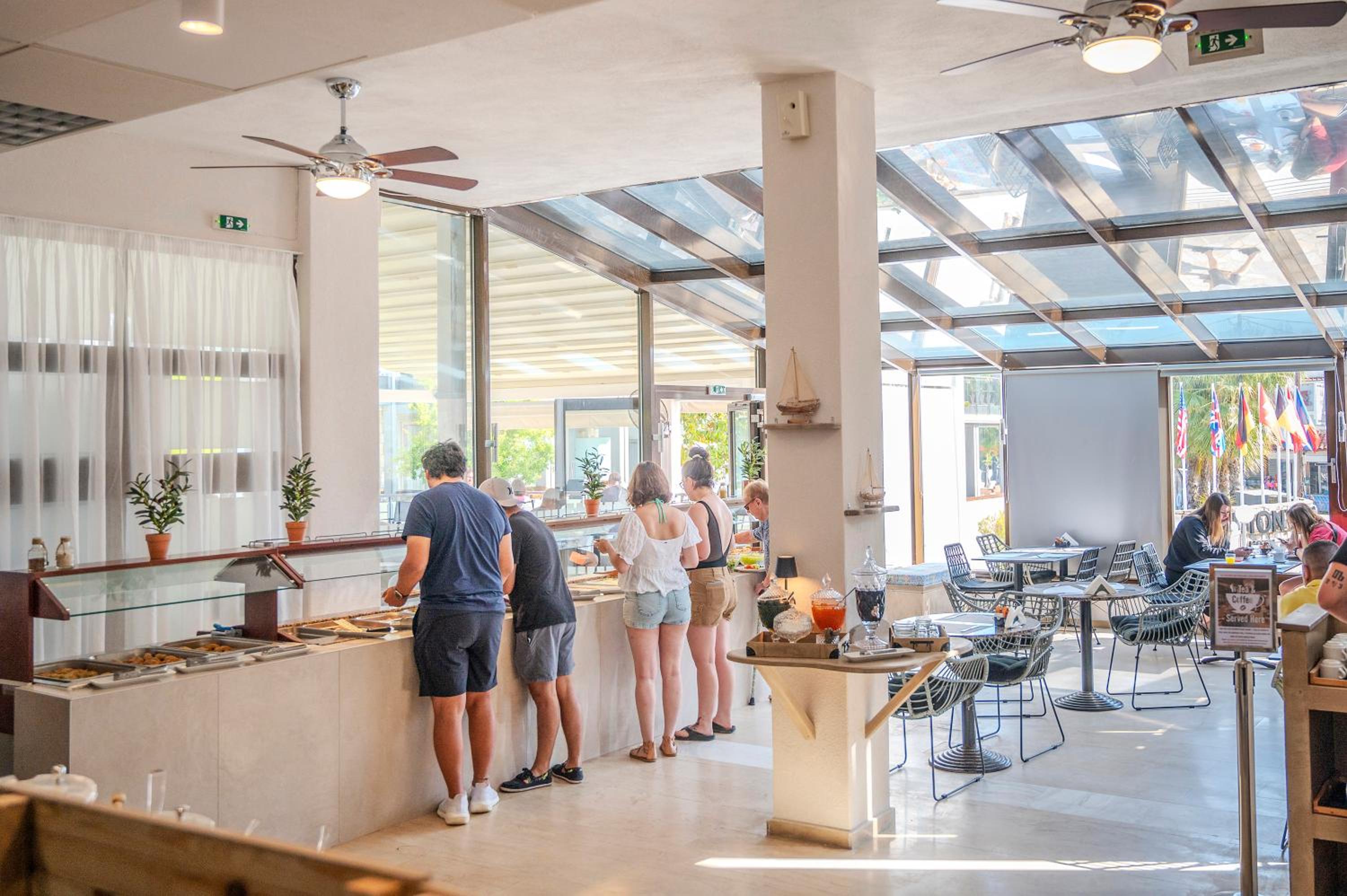 Фото Dionysos Hotel & Suites