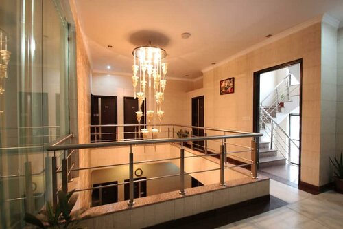 Внешний вид отеля Hollyhocks Residency в Гургаоне, фото 2