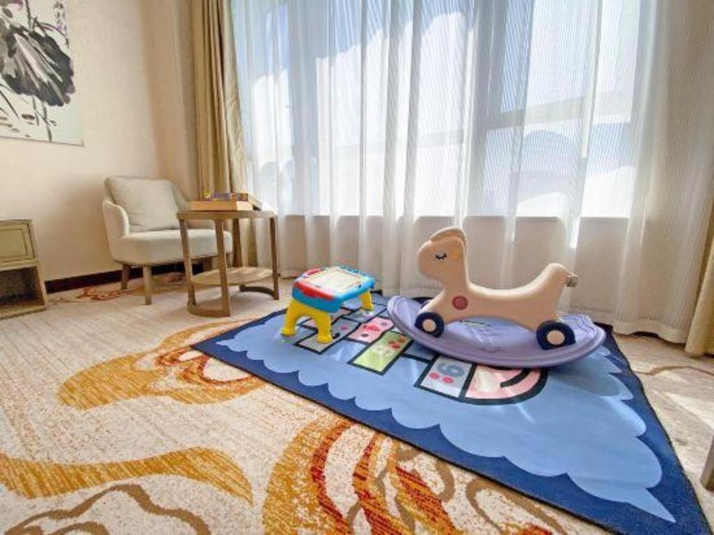 Фото Zijingang International