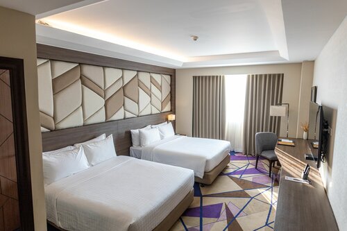 Гостиница Luxent Hotel в Кесон-Сити