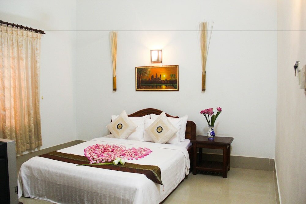 Фото Tropical Breeze Guesthouse