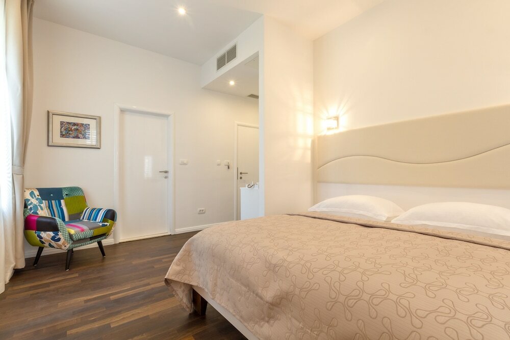 Фото Pellegrini Luxury Rooms